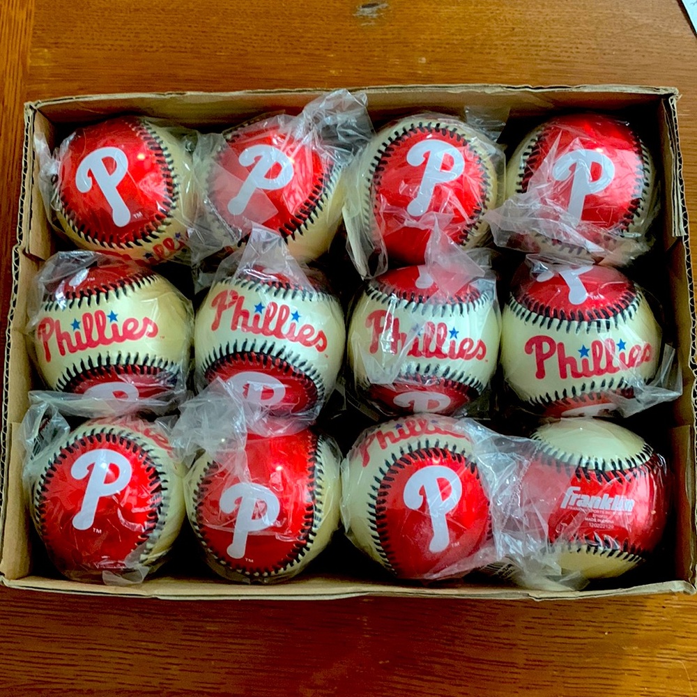One dozen Official size 9” Phillies Baseballs